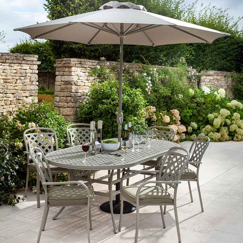 Berkeley 6 Seat Oval Outdoor Dining Set in Maize with Parasol & Base by Hartman