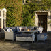 Bramblecrest Monterey Dove Rattan Curved Corner Sofa with Square Firepit table Table & 2 Benches