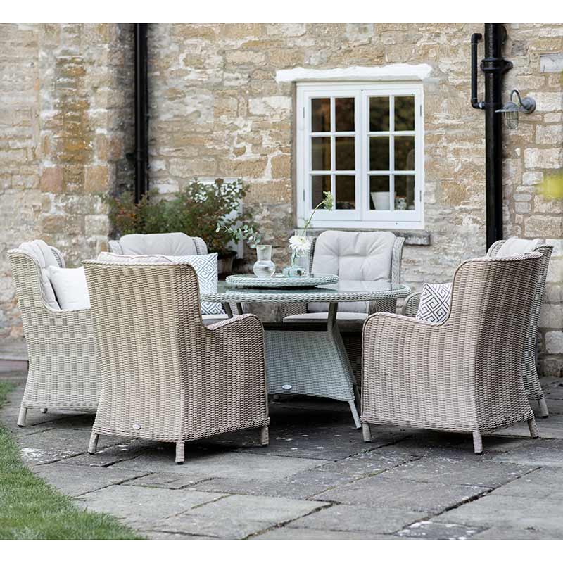 Bramblecrest Chedworth 4 Seat Garden Dining Set in Sandstone with Round Table, Parasol & Base