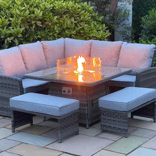 Mid Ulster Garden Centre Amalfi dark grey rattan corner sofa set with integrated glass-protected gas firepit table