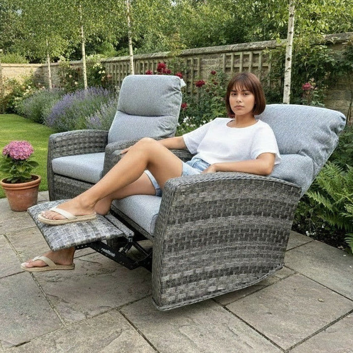 Mid Ulster Garden Centre Amalfi recliner sofa chair in grey weave with plush cushions on a garden patio.