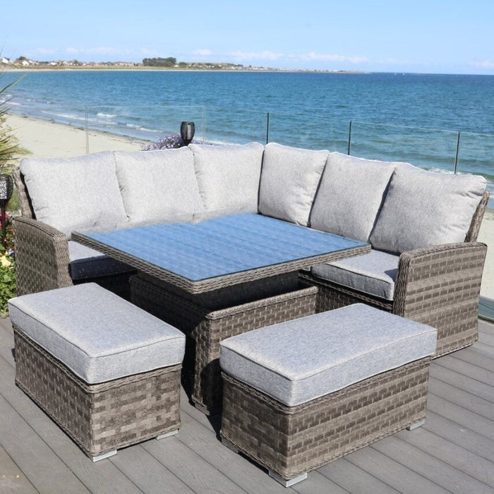Mid Ulster Garden Centre Amalfi corner sofa set with grey cushions, rattan weave, and height-adjustable dining table.