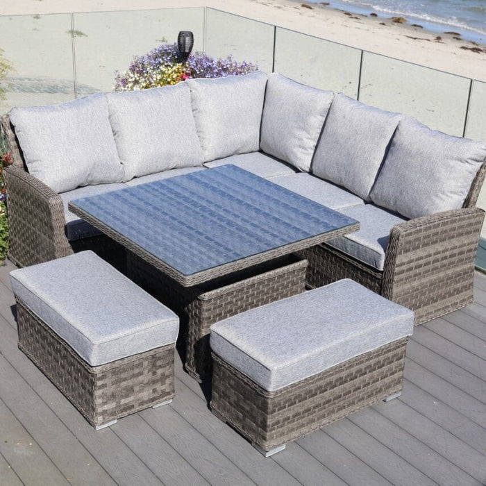 Mid Ulster Garden Centre Amalfi corner sofa set with grey cushions, rattan weave, and adjustable height dining table.