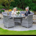 Mid Ulster Garden Centre Bali 6 seat grey rattan dining set with round glass table and cushions on a garden patio
