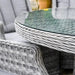 Mid Ulster Garden Centre Bali grey synthetic rattan dining table with tempered glass top and matching woven chairs