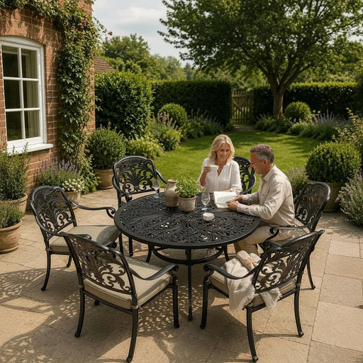 Mid Ulster Garden Centre Bramblecrest Venice 6-seater bronze aluminium dining set with parasol on a garden patio.
